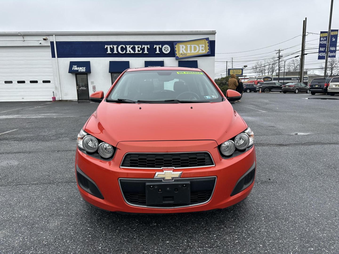 2013 ORANGE Chevrolet Sonic LT Auto 5-Door (1G1JC6SB3D4) with an 1.4L L4 DOHC 24V TURBO FFV engine, 6-Speed Automatic transmission, located at 1254 Manheim Pike, Lancaster, PA, 17601, (717) 393-9133, 40.062870, -76.323273 - Photo#1