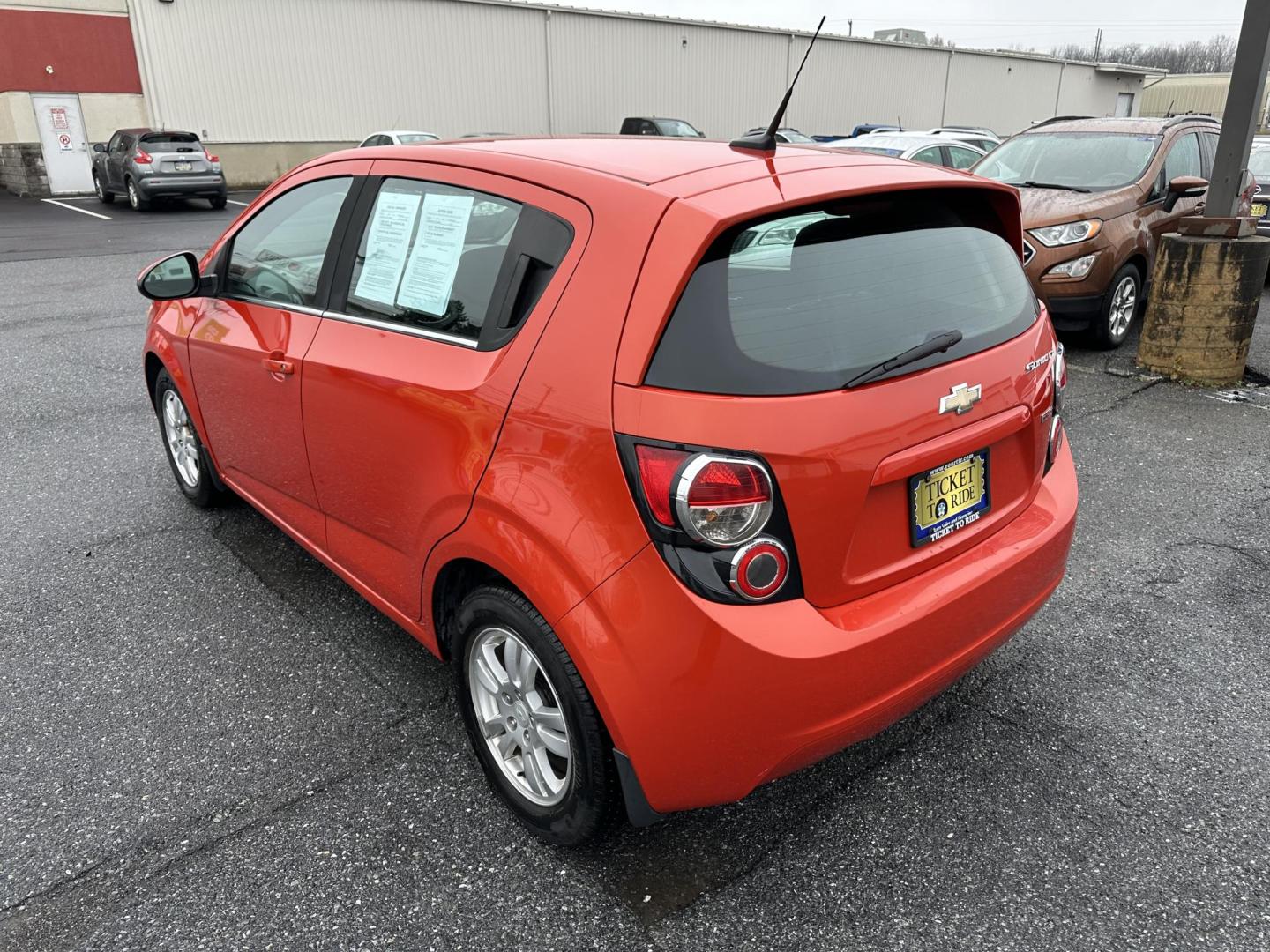 2013 ORANGE Chevrolet Sonic LT Auto 5-Door (1G1JC6SB3D4) with an 1.4L L4 DOHC 24V TURBO FFV engine, 6-Speed Automatic transmission, located at 1254 Manheim Pike, Lancaster, PA, 17601, (717) 393-9133, 40.062870, -76.323273 - Photo#5