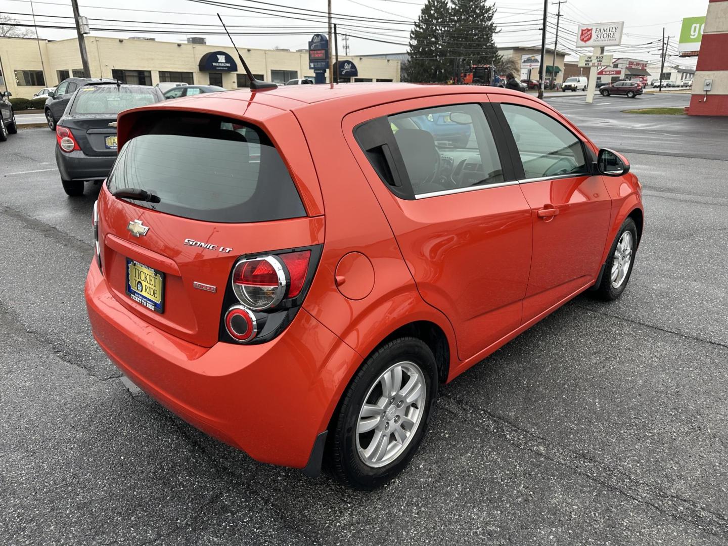 2013 ORANGE Chevrolet Sonic LT Auto 5-Door (1G1JC6SB3D4) with an 1.4L L4 DOHC 24V TURBO FFV engine, 6-Speed Automatic transmission, located at 1254 Manheim Pike, Lancaster, PA, 17601, (717) 393-9133, 40.062870, -76.323273 - Photo#6