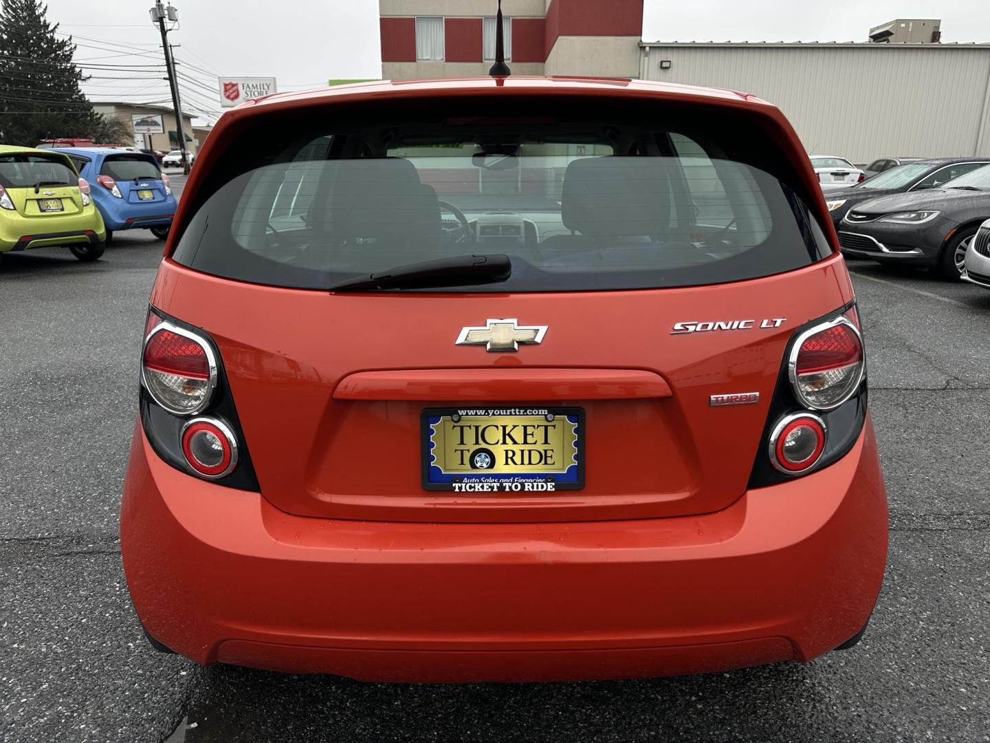 2013 ORANGE Chevrolet Sonic LT Auto 5-Door (1G1JC6SB3D4) with an 1.4L L4 DOHC 24V TURBO FFV engine, 6-Speed Automatic transmission, located at 1254 Manheim Pike, Lancaster, PA, 17601, (717) 393-9133, 40.062870, -76.323273 - Photo#7