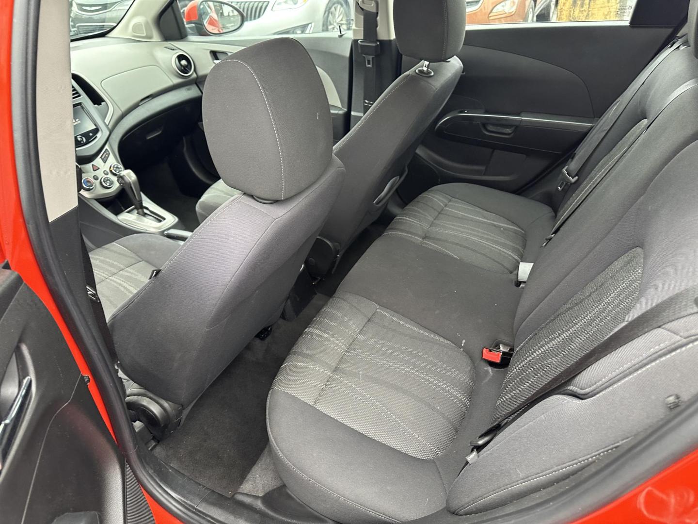 2013 ORANGE Chevrolet Sonic LT Auto 5-Door (1G1JC6SB3D4) with an 1.4L L4 DOHC 24V TURBO FFV engine, 6-Speed Automatic transmission, located at 1254 Manheim Pike, Lancaster, PA, 17601, (717) 393-9133, 40.062870, -76.323273 - Photo#9