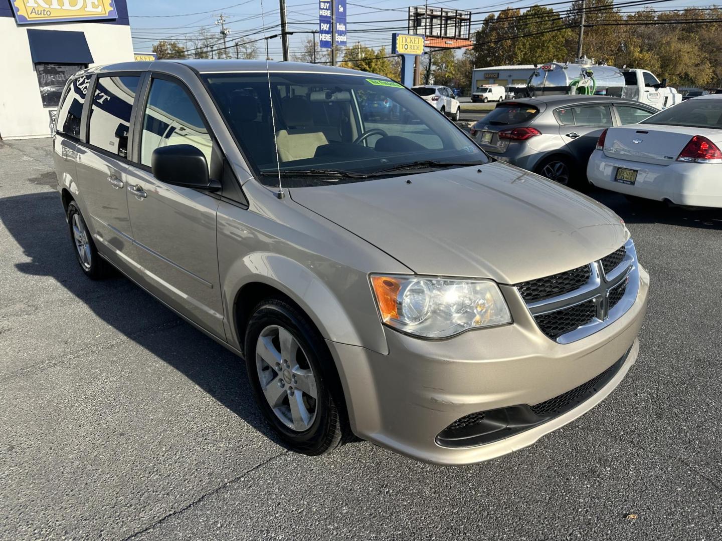 2013 GOLD Dodge Grand Caravan SE (2C4RDGBG2DR) with an 3.6L V6 DOHC 24V engine, 6-Speed Automatic transmission, located at 1254 Manheim Pike, Lancaster, PA, 17601, (717) 393-9133, 40.062870, -76.323273 - Photo#0