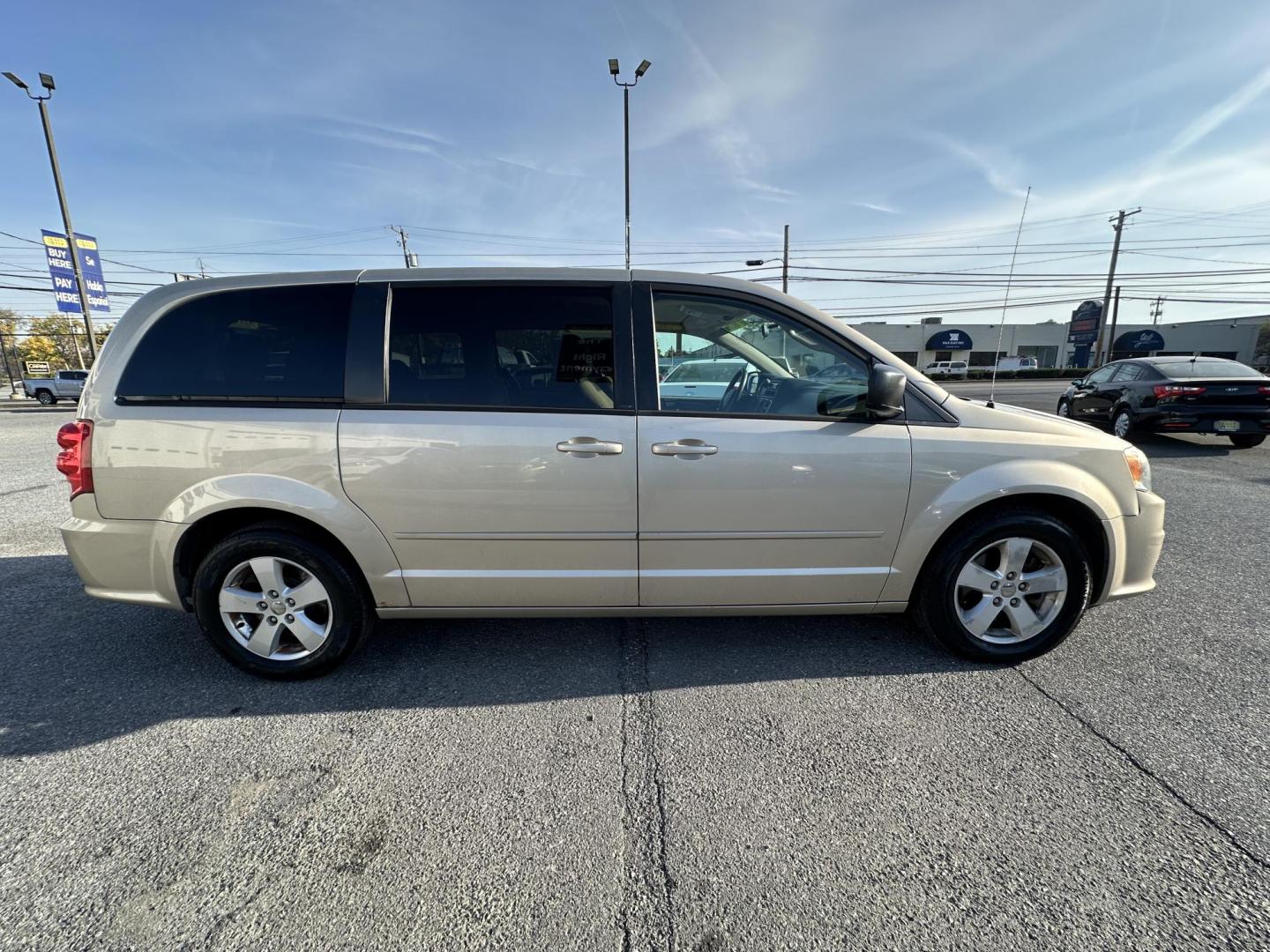 2013 GOLD Dodge Grand Caravan SE (2C4RDGBG2DR) with an 3.6L V6 DOHC 24V engine, 6-Speed Automatic transmission, located at 1254 Manheim Pike, Lancaster, PA, 17601, (717) 393-9133, 40.062870, -76.323273 - Photo#3