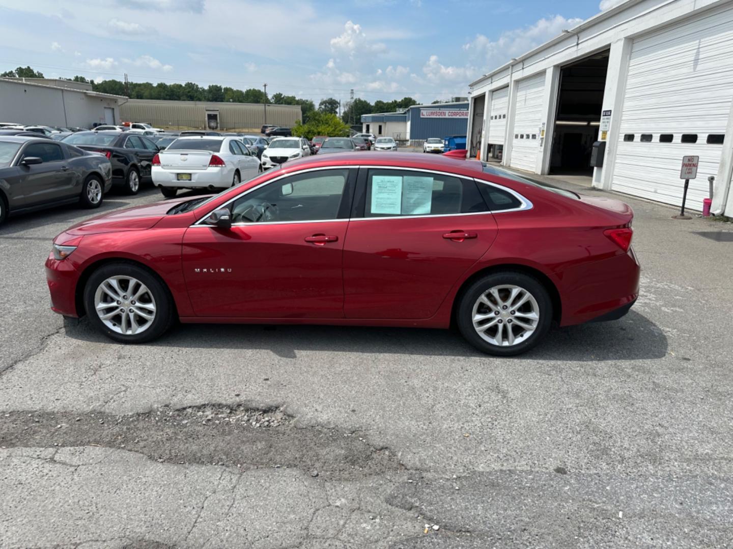 2016 RED Chevrolet Malibu 1LT (1G1ZE5ST4GF) with an 1.5L L4 DOHC 16V engine, 6A transmission, located at 1254 Manheim Pike, Lancaster, PA, 17601, (717) 393-9133, 40.062870, -76.323273 - Photo#4