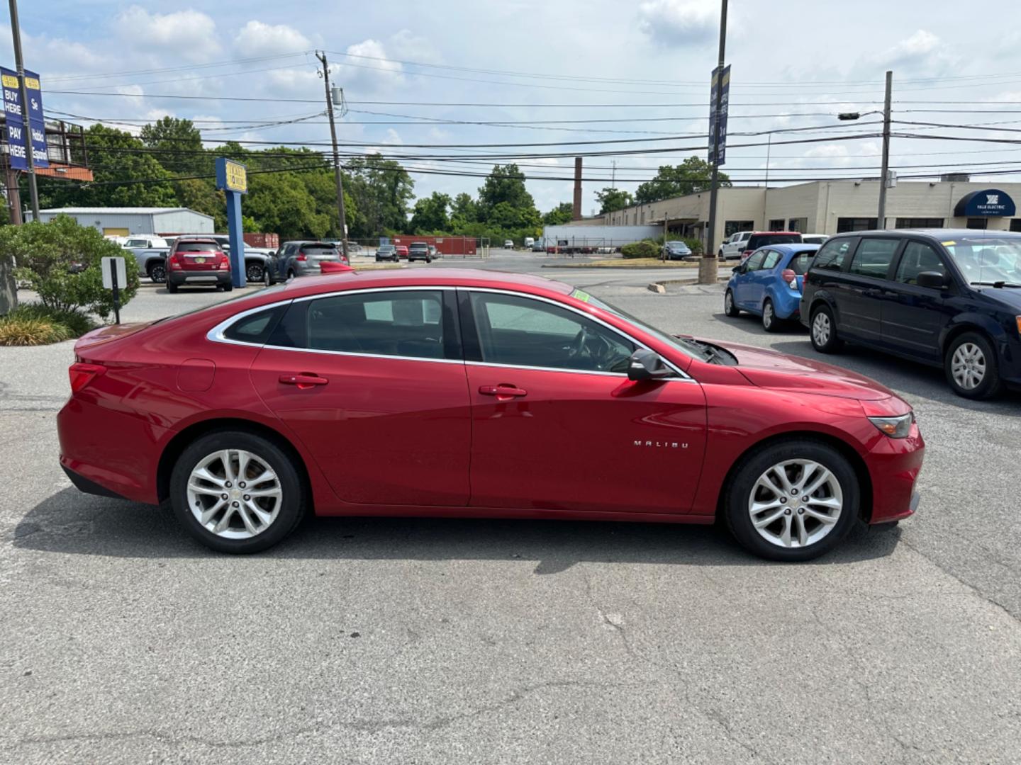 2016 RED Chevrolet Malibu 1LT (1G1ZE5ST4GF) with an 1.5L L4 DOHC 16V engine, 6A transmission, located at 1254 Manheim Pike, Lancaster, PA, 17601, (717) 393-9133, 40.062870, -76.323273 - Photo#2