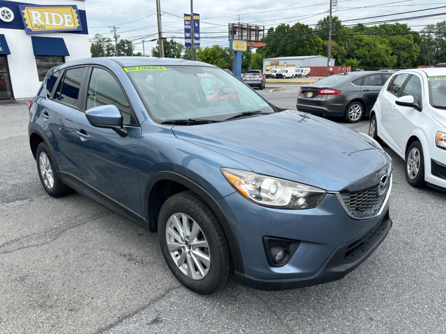 2015 BLUE Mazda CX-5 Touring AWD (JM3KE4CY7F0) with an 2.5L L4 DOHC 16V engine, 6-Speed Automatic transmission, located at 1254 Manheim Pike, Lancaster, PA, 17601, (717) 393-9133, 40.062870, -76.323273 - Photo#2