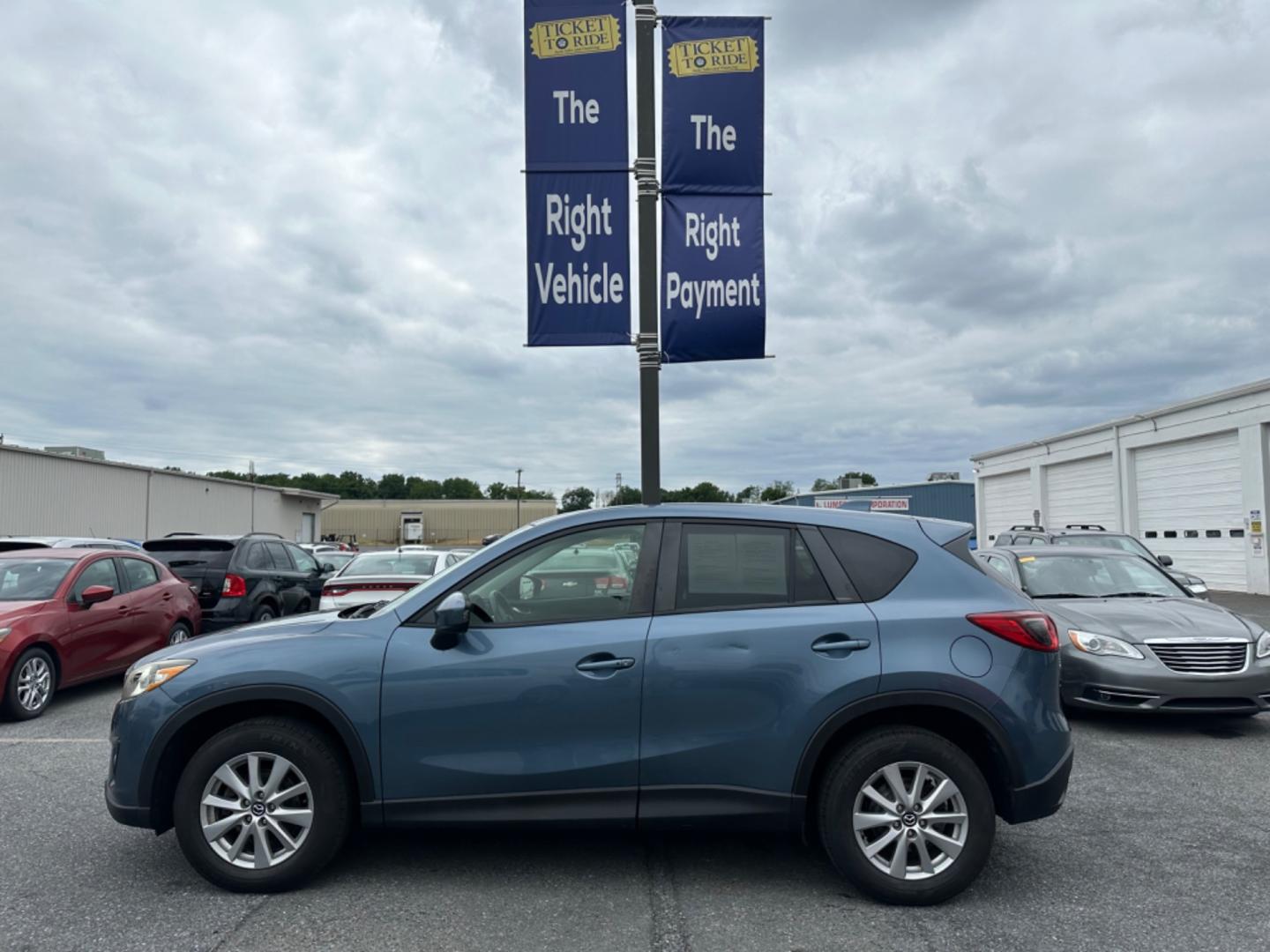 2015 BLUE Mazda CX-5 Touring AWD (JM3KE4CY7F0) with an 2.5L L4 DOHC 16V engine, 6-Speed Automatic transmission, located at 1254 Manheim Pike, Lancaster, PA, 17601, (717) 393-9133, 40.062870, -76.323273 - Photo#7