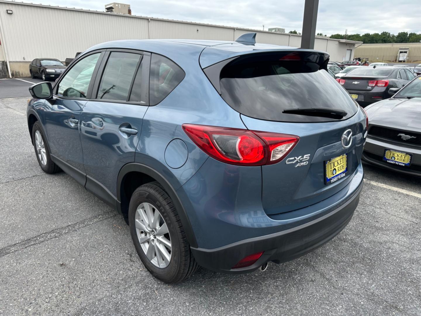 2015 BLUE Mazda CX-5 Touring AWD (JM3KE4CY7F0) with an 2.5L L4 DOHC 16V engine, 6-Speed Automatic transmission, located at 1254 Manheim Pike, Lancaster, PA, 17601, (717) 393-9133, 40.062870, -76.323273 - Photo#6