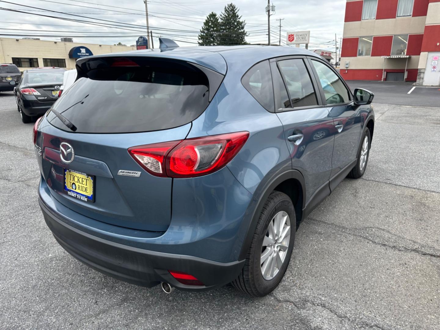 2015 BLUE Mazda CX-5 Touring AWD (JM3KE4CY7F0) with an 2.5L L4 DOHC 16V engine, 6-Speed Automatic transmission, located at 1254 Manheim Pike, Lancaster, PA, 17601, (717) 393-9133, 40.062870, -76.323273 - Photo#4