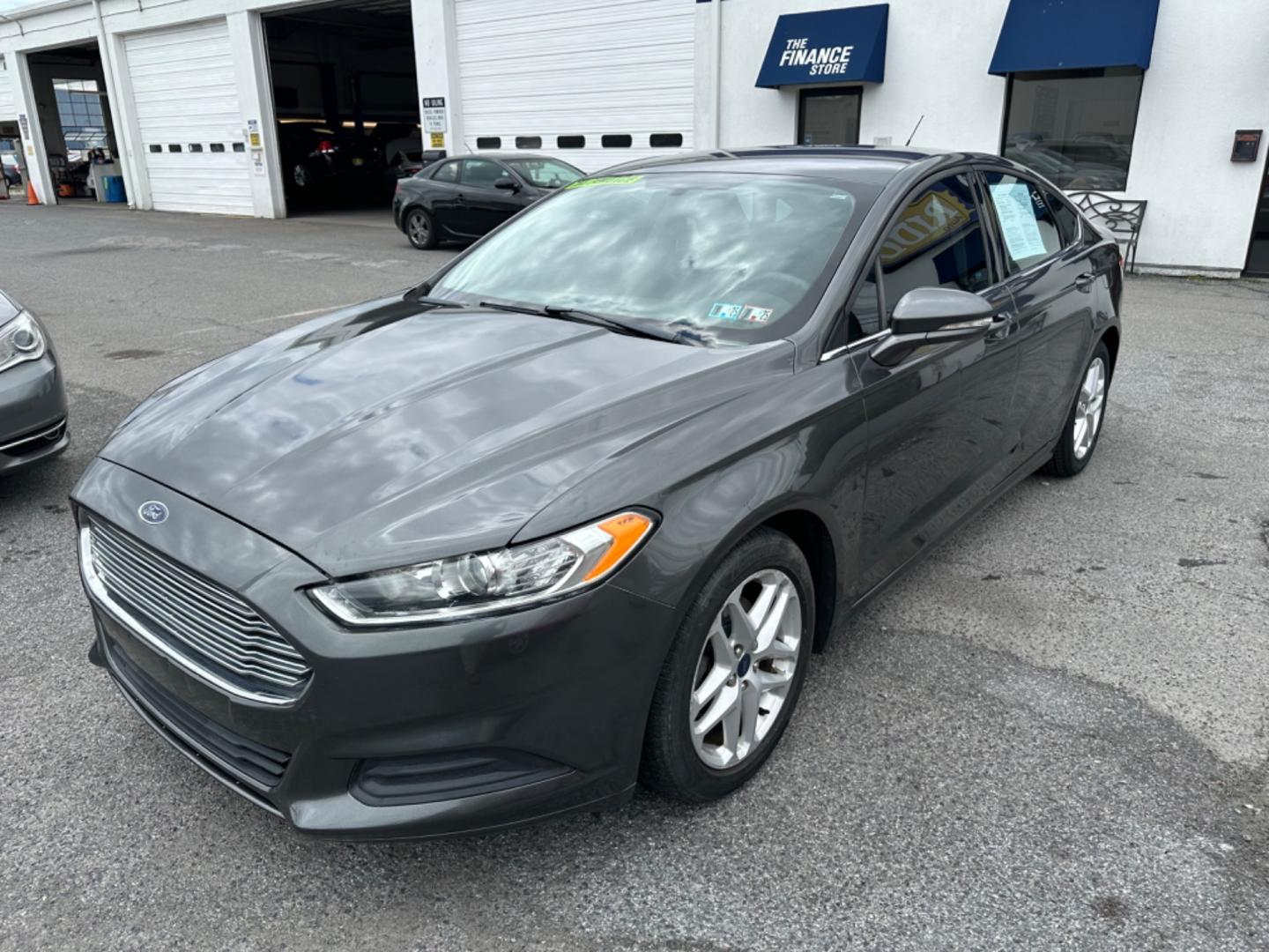 2016 GRAY Ford Fusion SE (3FA6P0HD9GR) with an 1.5L L4 DOHC 16V engine, 6-Speed Automatic transmission, located at 1254 Manheim Pike, Lancaster, PA, 17601, (717) 393-9133, 40.062870, -76.323273 - Photo#0