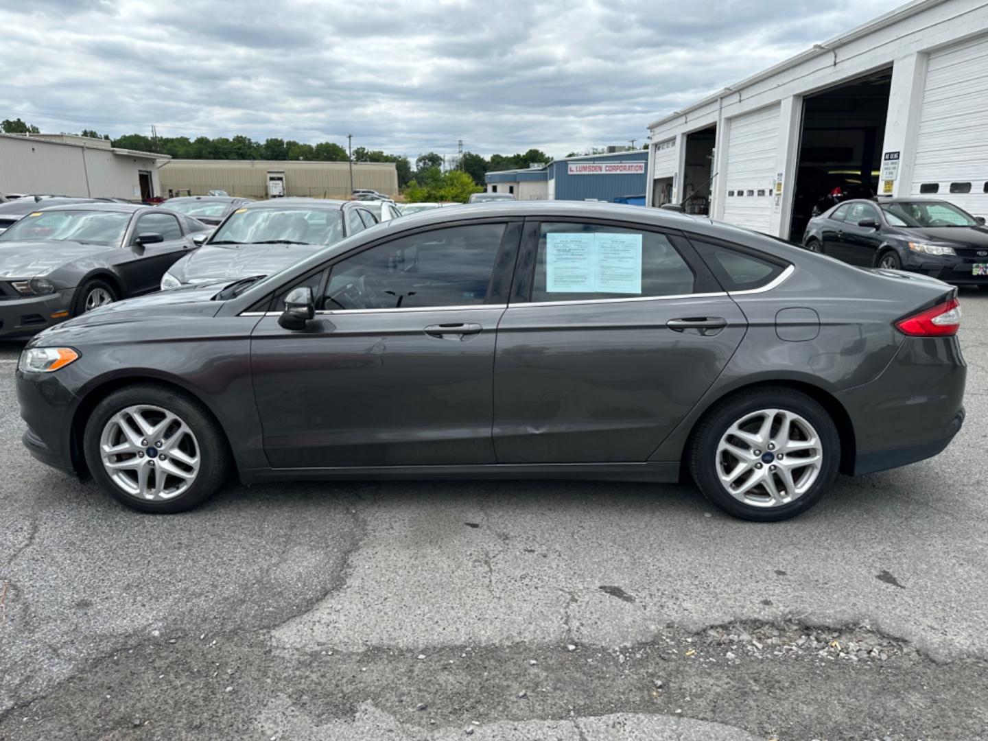 2016 GRAY Ford Fusion SE (3FA6P0HD9GR) with an 1.5L L4 DOHC 16V engine, 6-Speed Automatic transmission, located at 1254 Manheim Pike, Lancaster, PA, 17601, (717) 393-9133, 40.062870, -76.323273 - Photo#7