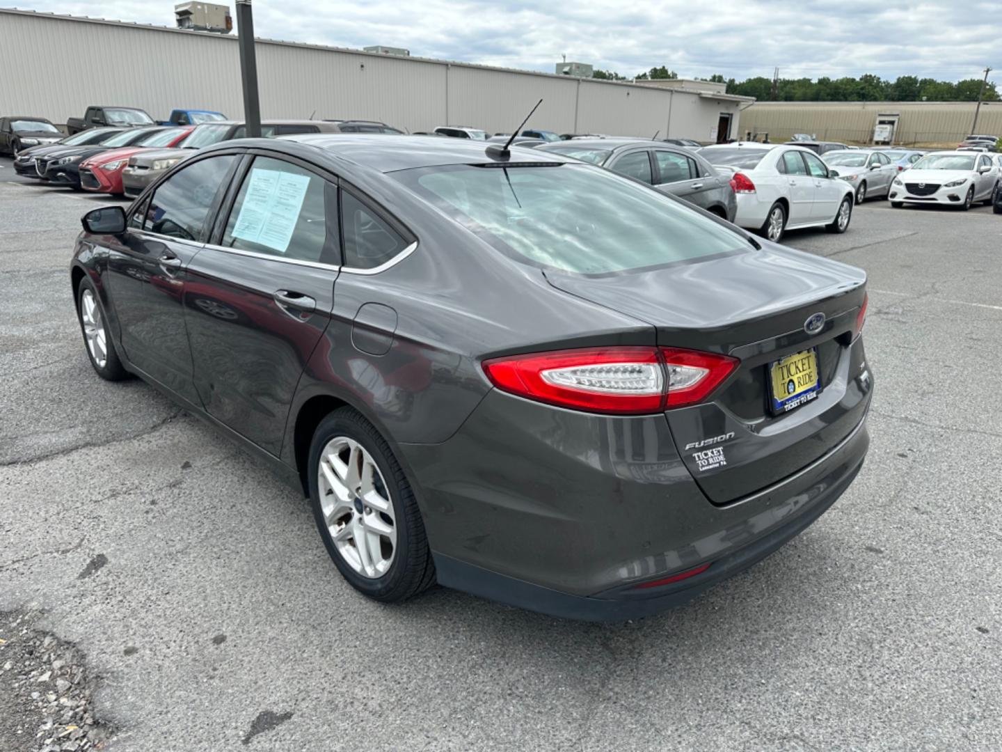 2016 GRAY Ford Fusion SE (3FA6P0HD9GR) with an 1.5L L4 DOHC 16V engine, 6-Speed Automatic transmission, located at 1254 Manheim Pike, Lancaster, PA, 17601, (717) 393-9133, 40.062870, -76.323273 - Photo#6