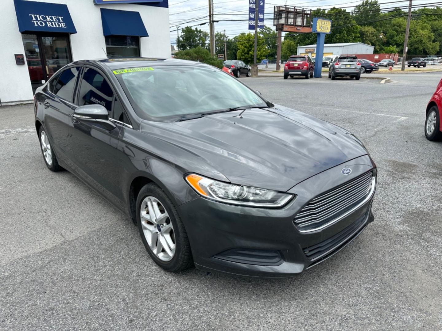 2016 GRAY Ford Fusion SE (3FA6P0HD9GR) with an 1.5L L4 DOHC 16V engine, 6-Speed Automatic transmission, located at 1254 Manheim Pike, Lancaster, PA, 17601, (717) 393-9133, 40.062870, -76.323273 - Photo#2