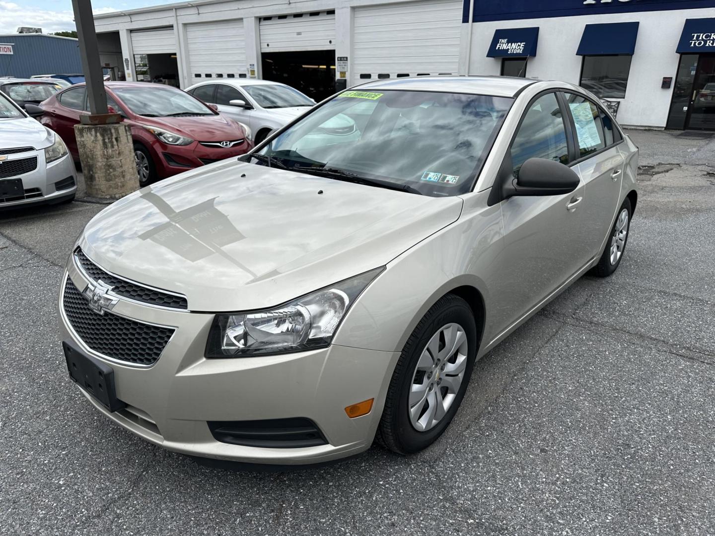 2014 GOLD Chevrolet Cruze LS Auto (1G1PA5SH9E7) with an 1.8L L4 DOHC 16V FFV engine, 6-Speed Automatic transmission, located at 1254 Manheim Pike, Lancaster, PA, 17601, (717) 393-9133, 40.062870, -76.323273 - Photo#0