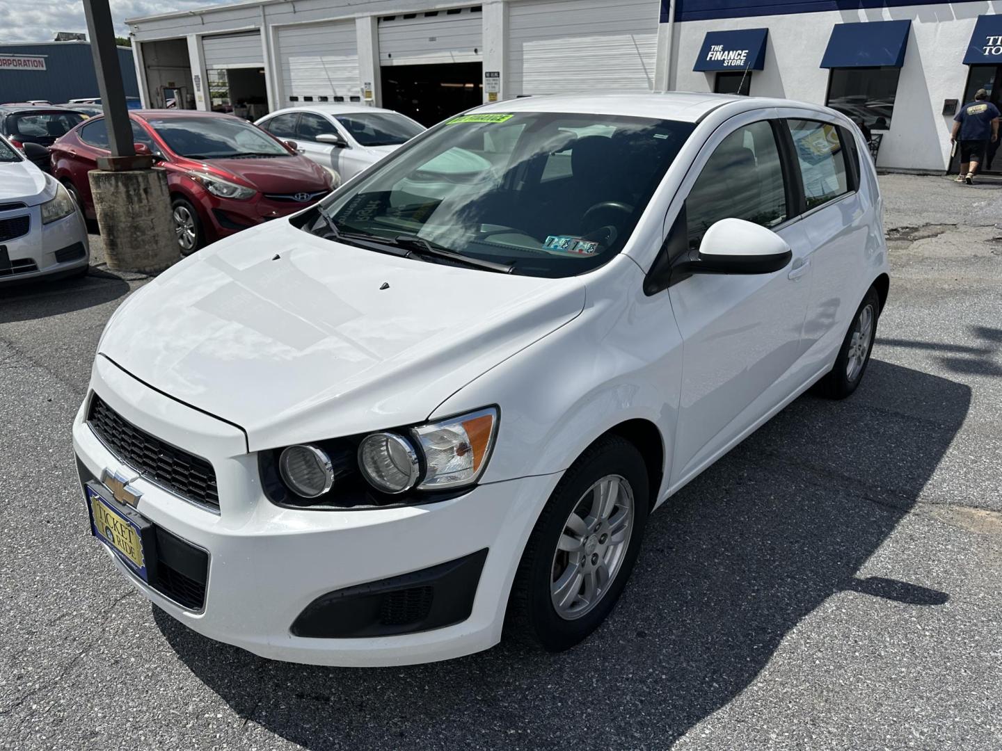 2015 WHITE Chevrolet Sonic LT Auto 5-Door (1G1JC6SHXF4) with an 1.8L L4 DOHC 24V engine, 6-Speed Automatic transmission, located at 1254 Manheim Pike, Lancaster, PA, 17601, (717) 393-9133, 40.062870, -76.323273 - Photo#0