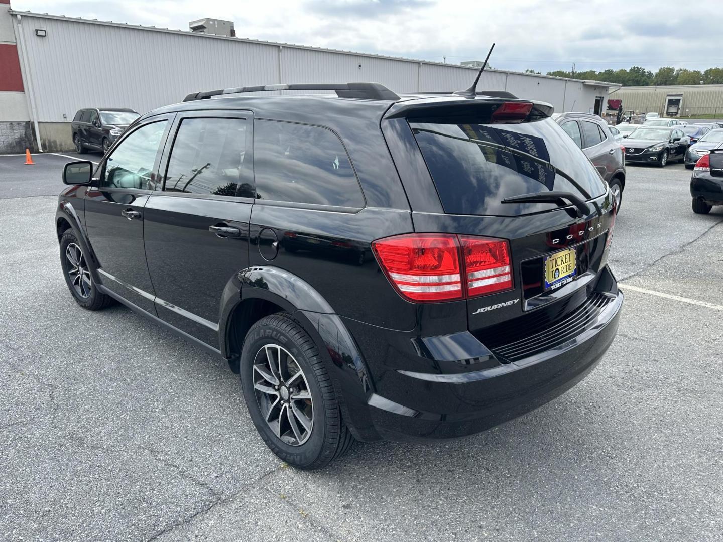 2017 BLACK Dodge Journey SE (3C4PDCAB7HT) with an 2.4L L4 DOHC 16V engine, 4A transmission, located at 1254 Manheim Pike, Lancaster, PA, 17601, (717) 393-9133, 40.062870, -76.323273 - Photo#5