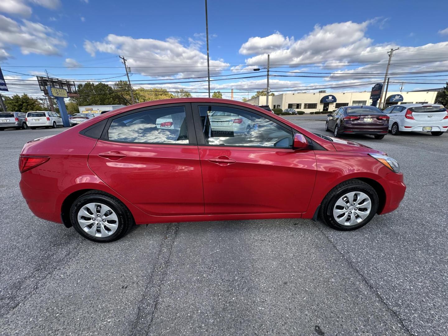 2016 RED Hyundai Accent SE 4-Door 6A (KMHCT4AE7GU) with an 1.6L L4 DOHC 16V engine, 6A transmission, located at 1254 Manheim Pike, Lancaster, PA, 17601, (717) 393-9133, 40.062870, -76.323273 - Photo#4