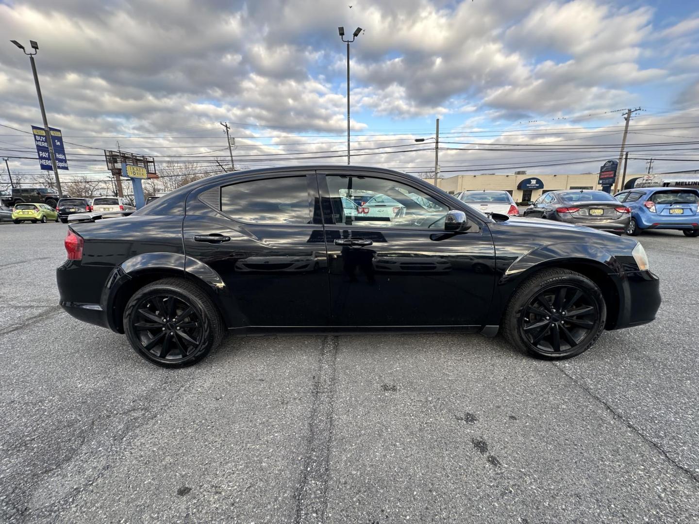 2013 BLACK Dodge Avenger SXT (1C3CDZCB1DN) with an 2.4L L4 DOHC 16V engine, 6-Speed Automatic transmission, located at 1254 Manheim Pike, Lancaster, PA, 17601, (717) 393-9133, 40.062870, -76.323273 - Photo#5