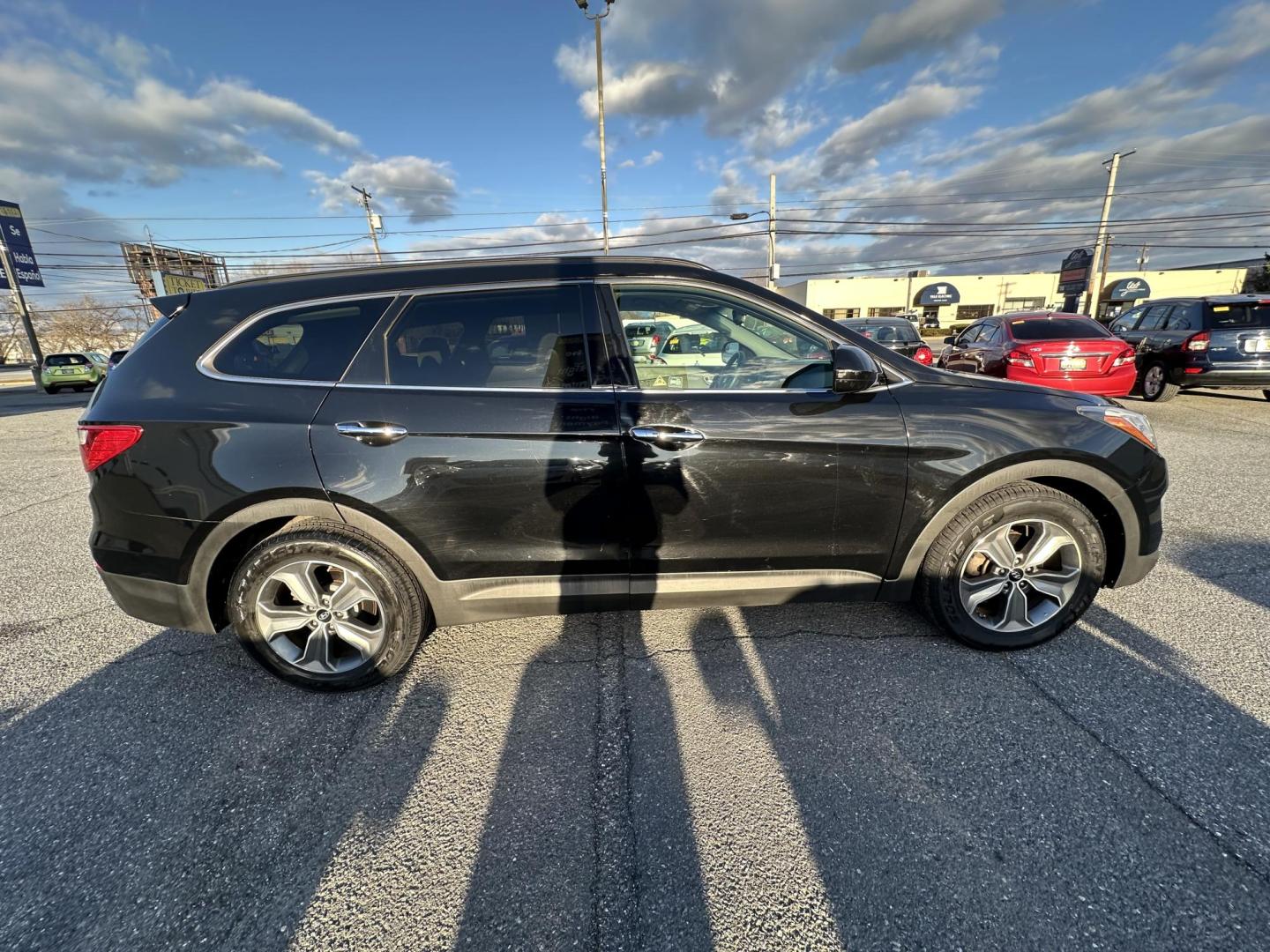 2016 BLACK Hyundai Santa Fe SE AWD (KM8SMDHF5GU) with an 3.3L V6 DOHC 24V engine, 6A transmission, located at 1254 Manheim Pike, Lancaster, PA, 17601, (717) 393-9133, 40.062870, -76.323273 - Photo#1