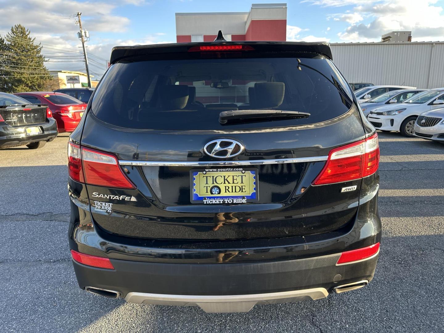 2016 BLACK Hyundai Santa Fe SE AWD (KM8SMDHF5GU) with an 3.3L V6 DOHC 24V engine, 6A transmission, located at 1254 Manheim Pike, Lancaster, PA, 17601, (717) 393-9133, 40.062870, -76.323273 - Photo#4