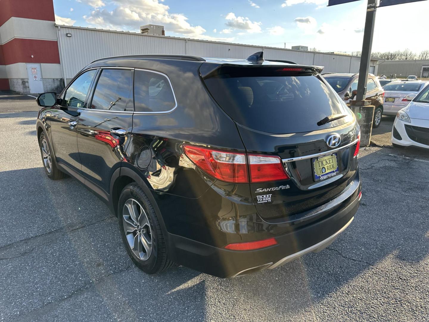 2016 BLACK Hyundai Santa Fe SE AWD (KM8SMDHF5GU) with an 3.3L V6 DOHC 24V engine, 6A transmission, located at 1254 Manheim Pike, Lancaster, PA, 17601, (717) 393-9133, 40.062870, -76.323273 - Photo#5