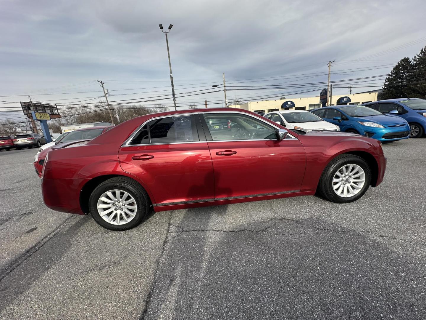 2012 MAROON Chrysler 300 Base (2C3CCAAG4CH) with an 3.6L V6 SOHC 24V engine, 5-Speed Automatic transmission, located at 1254 Manheim Pike, Lancaster, PA, 17601, (717) 393-9133, 40.062870, -76.323273 - Photo#3