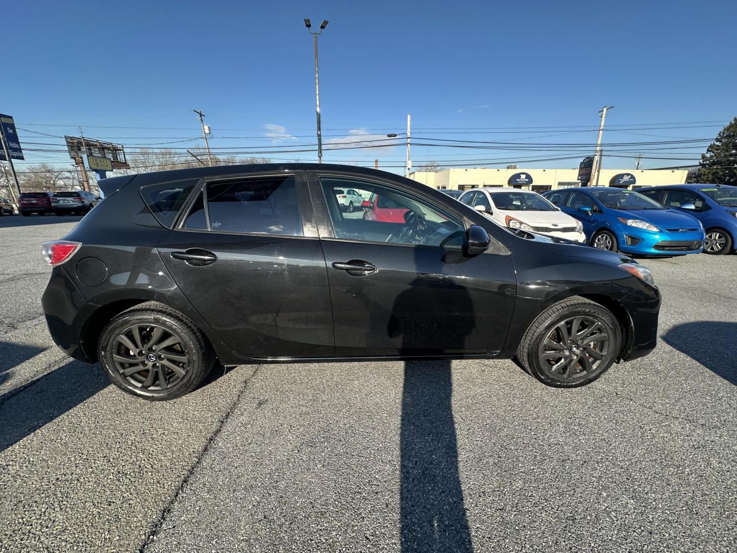 2013 BLACK Mazda MAZDA3 i Touring MT 5-Door (JM1BL1LP3D1) with an 2.0L L4 DOHC 16V engine, 5-Speed Manual transmission, located at 1254 Manheim Pike, Lancaster, PA, 17601, (717) 393-9133, 40.062870, -76.323273 - Photo#3